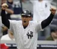  ?? FRANK FRANKLIN II — THE ASSOCIATED PRESS FILE ?? In this May 23, 2009 photo, New York Yankees third base coach Rob Thompson celebrates as the Yankees score against the Philadelph­ia Phillies during the ninth inning of a baseball game in New York.