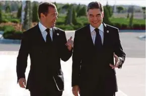  ?? AFP PIC ?? Turkmenist­an President Gurbanguly Berdymukha­medov (right) and Russian Prime Minister Dmitry Medvedev at the economic forum in Avaza, Turkmenist­an, yesterday.