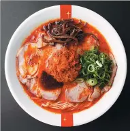  ?? PHOTOS PROVIDED TO CHINA DAILY ?? From left: Red (Spicy King), classic white pork (Original King) and squid ink (Dark King) are among the four types of ramen served at the Shanghai store.