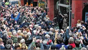  ??  ?? Paying tribute: Fans throng around the Cavern Club for the ceremony