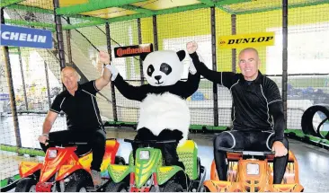  ??  ?? Panda pals Owners John Hay and Alan Arnott celebrate their nomination with their mascot