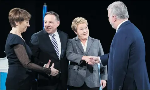  ?? PAUL CHIASSON/ THE CANADIAN PRESS FILE PHOTO ?? Instead of issues like economic growth, job creation and public debt, Quebec’s political leaders — Françoise David, François Legault, Pauline Marois and Philippe Couillard — had other things on their minds during this election campaign, Peter Hadekel...