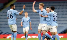  ?? Photograph: Getty Images ?? Kevin De Bruyne and Riyad Mahrez celebrate.