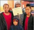  ?? SUBMITTED PHOTO ?? Dineen Jones, center, stands with twins Samiya, left, and Sanaa, and their brother Tyrone.