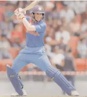  ?? — PTI ?? India's Smriti Mandhana in action against Pakistan in the Asia Cup T20 tournament in Kuala Lumpur.