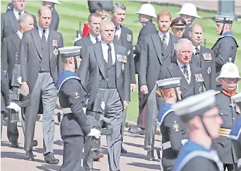  ??  ?? (From left) Prince William, Prince Andrew, Prince Harry, Prince Charles and Prince Edward follow the coffin during the ceremonial funeral procession of Prince Philip to St George’s Chapel in Windsor Castle in Windsor.