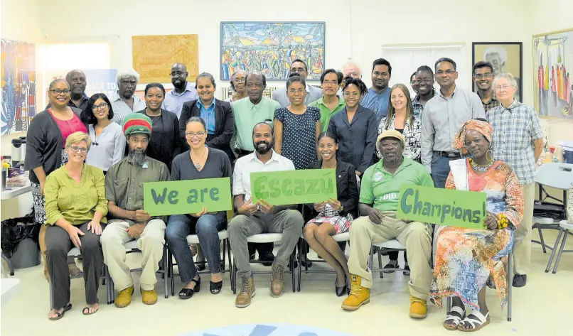  ?? AP ?? T&T civil society calls on the government to sign and ratify the Escazú Agreement at a workshop in July 2019.