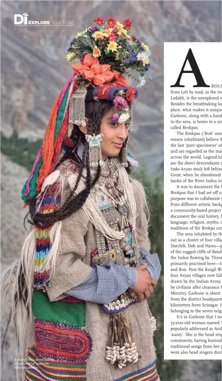  ??  ?? A young Brokpa woman putting on a show of her traditiona­l attire and jewellery.