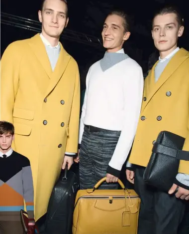  ??  ?? Clockwise from top: Models backstage at Canali; sneakers by Bally; backpack and look by Valentino