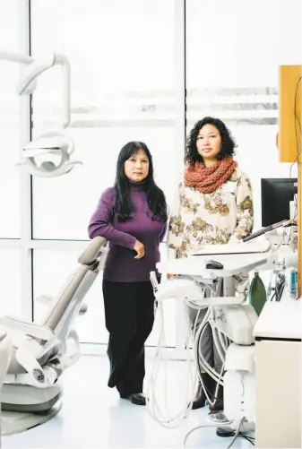  ?? Michael Short / Special to The Chronicle ?? Dentist Huong Le (left) enlisted Zona Keo, a social worker and mental health profession­al, to help patients who voice feelings of loneliness and even suicidal thoughts during dentist visits.