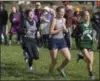  ?? JEN FORBUS — THE MORNING JOURNAL ?? Runners from Westlake, North Ridgeville and Midview compete in the SWC cross country championsh­ip race at Lorain County Community College October 13.