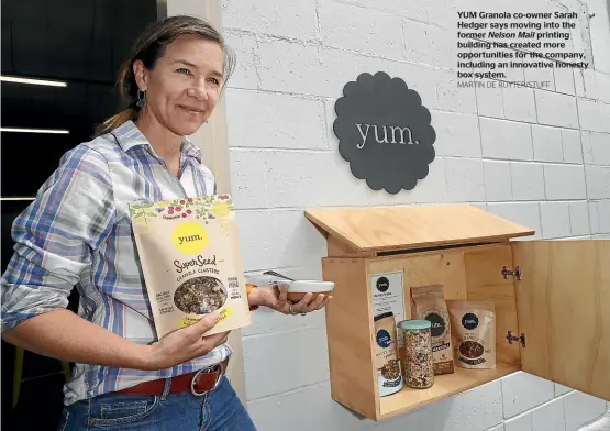  ?? MARTIN DE RUYTER/STUFF ?? YUM Granola co-owner Sarah Hedger says moving into the former Nelson Mail printing building has created more opportunit­ies for the company, including an innovative honesty box system.