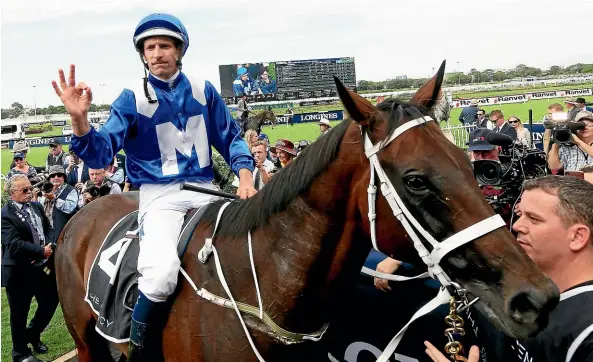  ??  ?? Hugh Bowman on Winx returns to scale after winning the George Ryder Stakes during Golden Slipper Day at Rosehill.