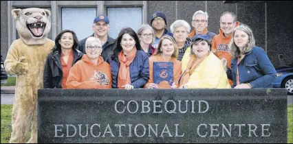  ?? SUBMITTED PHOTO ?? The Class of 1978 Reunion Committee members have been busy preparing for their upcoming gathering, which takes place July 28. Those who recently joined Cecil, the mascot, in front of the school were, front row, from left, Linda (Joe) Sears, Lori Ross-obrien, Carolyn (Otto) Yuill, Robyn (Pickrem) Deveau, Cathy Hinton and Kim (Anthony) Forster. Second row, Greg Perry, Sandra (Guinan) Donaldson, Butch Borden, Janice Bailey, Kevin Sibley and Jay Brenton. Absent were Janice (Burris) Guinan and Terry Matheson.