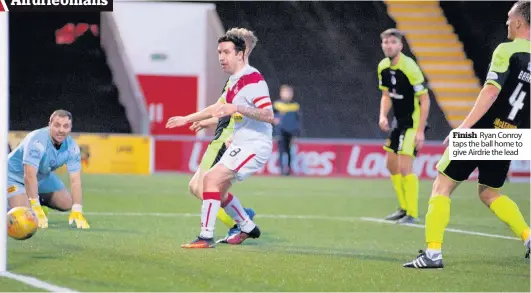  ??  ?? Finish Ryan Conroy taps the ball home to give Airdrie the lead