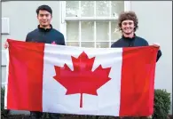  ?? PHOTO SUBMITTED ?? Dat Le (left) and Kade Kleinknech­t pose with a Canadian flag in Dublin, Ireland last month, where they competed at WKC World Championsh­ips.