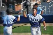  ?? AUSTIN HERTZOG - DIGITAL FIRST MEDIA ?? Oley Valley’s Pete Vaccaro, right, is congratula­ted by Gavin Troutman after scoring a run during the District 3-AA semifinals against Camp Hill on May 31.