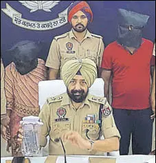  ?? HT PHOTO ?? Accused Narinder Kaur and her paramour Simerjit Singh Dogar in police custody.