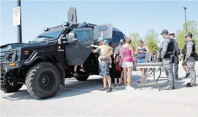  ?? JOHN LAW TORSTAR ?? Fire trucks, police vehicles and other big vehicles were part of Saturday’s Touch-a-Truck event at Gale Centre in Niagara Falls.