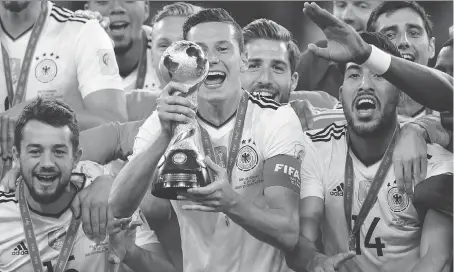  ?? THE ASSOCIATED PRESS/FILES ?? The unloved Confederat­ions Cup — won by Julian Draxler’s Germany team this year — could be replaced by a new event.