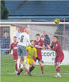  ?? ?? Brechin’s Euan Spark, number 6, heads a chance wide.