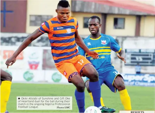  ?? Photo: LMC ?? Okiki Afolabi of Sunshine and Gift Oke of Heartland duel for the ball during their match in the ongoing Nigeria Profession­al Football League.