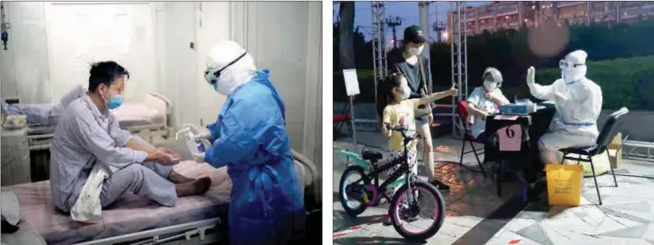  ?? PENG ZIYANG / XINHUA ZOU HONG / CHINA DAILY ?? A nurse disinfects a patient at the hospital. Su Beini, 7, gives the thumbs up to doctors after being tested at a residentia­l area in Dongcheng district last month.