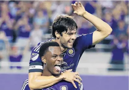  ?? STEPHEN M. DOWELL/STAFF PHOTOGRAPH­ER ?? Orlando City captain Kaká celebrates a goal with rookie Cyle Larin, one of the young Lions the Brazilian has helped mentor this season.