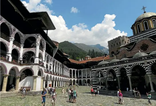  ?? JILL WORRALL ?? Rila Monastery, in the mountains of Bulgaria, is unveiled in a glory of striped layers of white stone and brick.