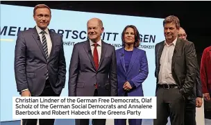  ?? ?? Christian Lindner of the German Free Democrats, Olaf Scholz of the German Social Democrats and Annalene Baerbock and Robert Habeck of the Greens Party