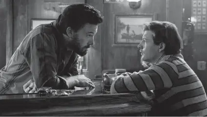  ?? Amazon photos ?? Ben Affleck, left, and Tye Sheridan get philosophi­cal in a scene from “The Tender Bar,” based on the memoir by J.R. Moehringer.