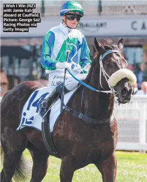  ?? Picture: George Sal/ Racing Photos via Getty Images ?? I Wish I Win (NZ) with Jamie Kah aboard at Caulfield.