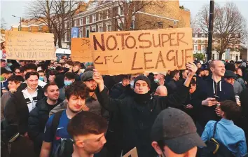  ?? AFP ?? Supporters demonstrat­e against the proposed European Super League outside of Stamford Bridge in London, ahead of the English Premier League match against Brighton yesterday.