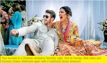  ??  ?? They married in a Christian ceremony Saturday night. And on Sunday, Nick Jonas and Priyanka Chopra celebrated again with a traditiona­l Hindu ceremony