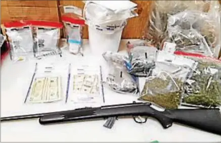  ?? PHOTO COURTESY MADISON COUNTY SHERIFF’S DEPARTMENT ?? The Madison County Sheriff’s Department seized methamphet­amine, cocaine, marijuana, a rifle and cash during a meth lab raid in the Town of Brookfield on Wednesday, Nov. 22, 2017.