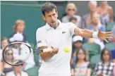  ?? PHOTOS BY SUSAN MULLANE, USA TODAY SPORTS ?? Novak Djokovic retired in his quarterfin­al match due to a bothersome right elbow injury.