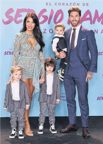  ??  ?? Sergio Ramos, his wife Pilar Rubio and their children attend the premiere of the defender’s documentar­y in Madrid last month.