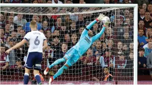  ?? Reuters ?? Middlesbro­ugh’s Darren Randolph makes a save against Aston Villa on Tuesday. —