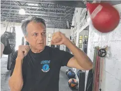  ?? Picture: PALM BEACH POST VIA AP ?? BRING IT ON: Steve Shepherd, a world champion kickboxer, works out in West Palm Beach, Florida. Shepherd gave a mugger a good lesson in self-defence.
