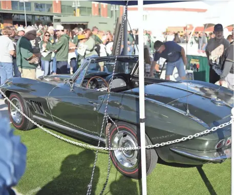  ?? RICHARD RYMAN/USA TODAY NETWORK-WISCONSIN ?? The 1967 Corvette awarded to Bart Starr as Super Bowl I MVP was on display at Lambeau Field on Aug. 31, 2017.