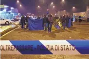  ?? DANIELE BENNATI/ASSOCIATED PRESS ?? Italian police cordon off an area after a shootout between police and alleged Berlin Christmas market attacker Anis Amri in Milan, Italy, Friday.