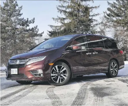  ?? DEREK MCNAUGHTON/DRIVING ?? Honda’s 2018 Odyssey Touring still blurts soccer mom, but it does it with a sexier flourish, writes Derek McNaughton.