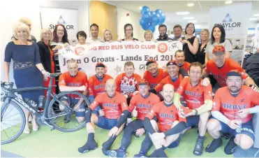  ??  ?? > Aldridge Shaylor staff with the cycle team who rode from John O’Groats to Lands End