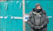  ?? REUTERS ?? A British police officer stands next to screening around a restaurant which was visited by former Russian spy Sergei Skripal.