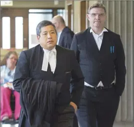  ?? CP PHoTo ?? William Sandeson’s defence team, Brad Sarson, right, and Eugene Tan are shown at Nova Scotia Supreme Court in Halifax on Friday.