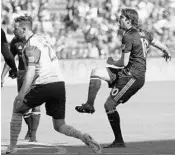  ?? STEPHEN M. DOWELL/STAFF PHOTOGRAPH­ER ?? Orlando’s Kaká, right, kicks past Colorado player Bobby Burling during the Lions vs. Rapids match Saturday.