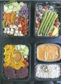  ?? Gretchen McKay/Post-Gazette ?? Sprinly delivers pre-portioned, microwavab­le meals right to your door.