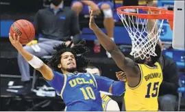  ?? Darron Cummings Associated Press ?? POINT GUARD Tyger Campbell and the 11th-seeded UCLA Bruins go into today’s national semifinal as a 14-point underdog against top-seeded Gonzaga.