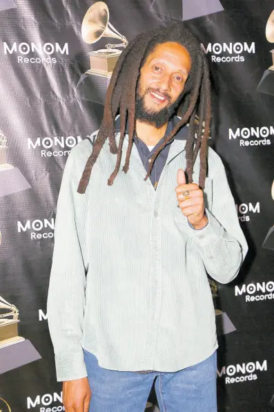  ?? PHOTOS BY NATHANIEL STEWART/PHOTOGRAPH­ER ?? Julian Marley was in a celebrator­y mood on Thursday as industry players gathered at Ribbiz in celebratio­n of ‘Colors of Royal’, done in collaborat­ion with Alex Antaeus, which received the Grammy for Best Reggae Album.