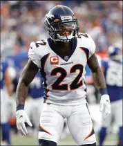  ?? Tim Nwachukwu / Getty Images ?? The Broncos’ Kareem Jackson celebrates during the fourth quarter of Sunday’s game against the Giants at Metlife Stadium in East Rutherford, N.J.